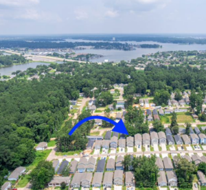 An aerial view to show how close to Lake Conroe the home is.
